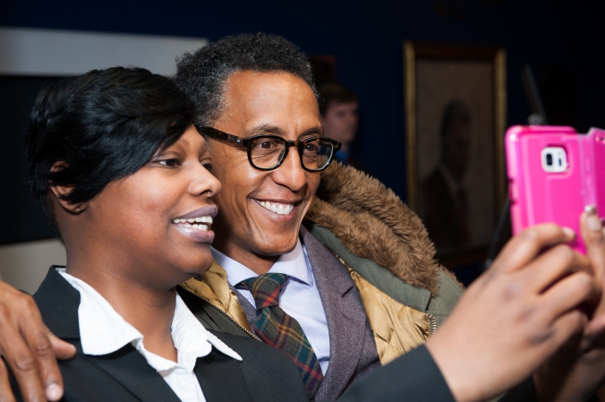 HBO star Andre Royo, Bubbles from The Wire, poses with fan at Mavis! documentary premiere, Chicago DuSable Museum African American History