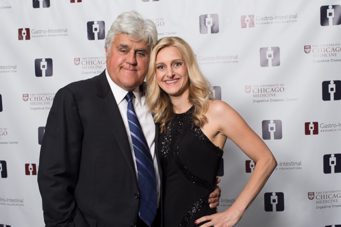 Jay Leno poses with fan for a step and repeat photo, GIRF Ball annual fundraising gala