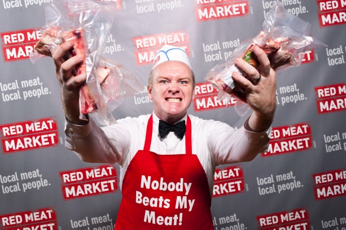 Nobody beats my meat! Step and repeat photo at the Red Meat Market launch party