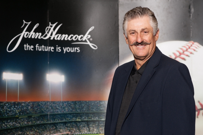 Celebrity baseball pitcher Rollie Fingers appears on behalf John Hancock, tradeshow photobooth with onsite printing.