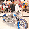 Orange County Choppers, Paul Jr with his wife, wide angle photo Faro chopper, celebrity appearance Quality Expo, FARO chopper, onsite printing FAB PHOTO Chicago