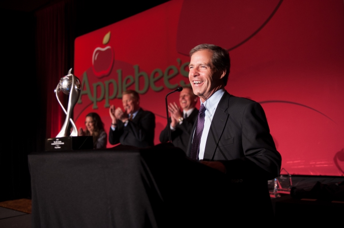 applebees annual sales meeting award dinner, conference photography of awards speaker at podium, intercontinental chicago