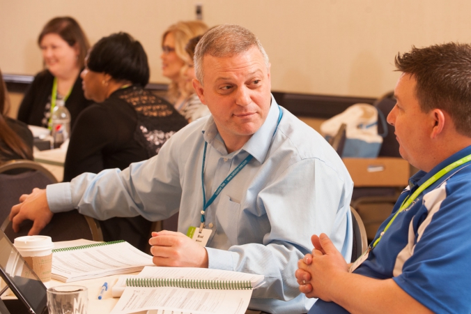 conference photo, attendees get to know each other during team building exercise