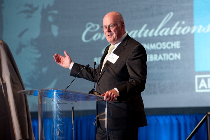 Speaker addresses audience at retirement celebration for Ben Moshe, CEO of AIG, event photography by fab photo.
