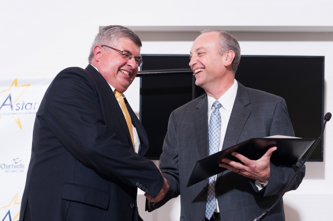 grip and grin photo at chartwell's annual award presentation, event photography by fab photo.