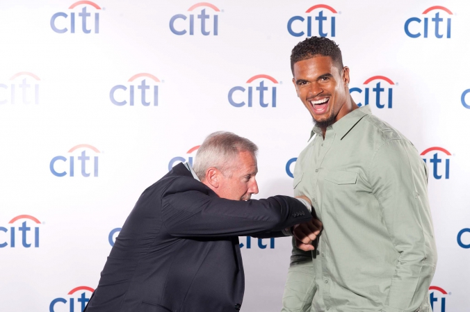 Chicago Bears Cory Wootton has fun with fan at Citi Bank Bulls Bears meet and greet, onsite printing provided by fab photo.