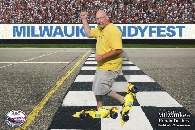 man wears formula cars for roller skates, milwaukee indyfest, green screen onsite photo print souvenir, sponsored by milwaukee honda dealers, green screen photography by fab photo chicago