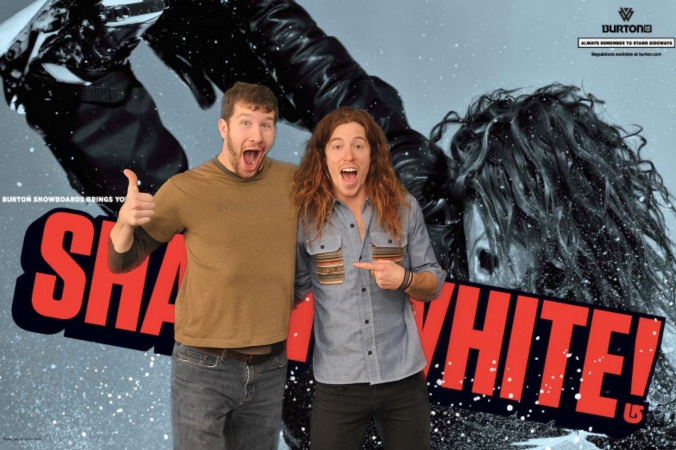 stoked fan poses with celebrity superstar shaun white at burton snowboard green screen photo activity