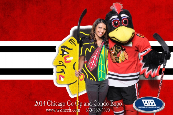 fan poses with tommy hawk, gets logo branded photo print onsite, expo, navy pier, chicago