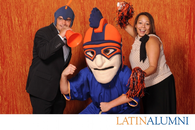 latin alumni photobooth featuring logo branding, studio lighting, and onsite instant photo printing