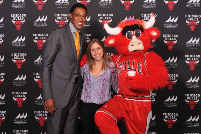 NBA Chicago Bulls legend Scottie Pippen poses on the step and repeat with benny the bull and lucky fan
